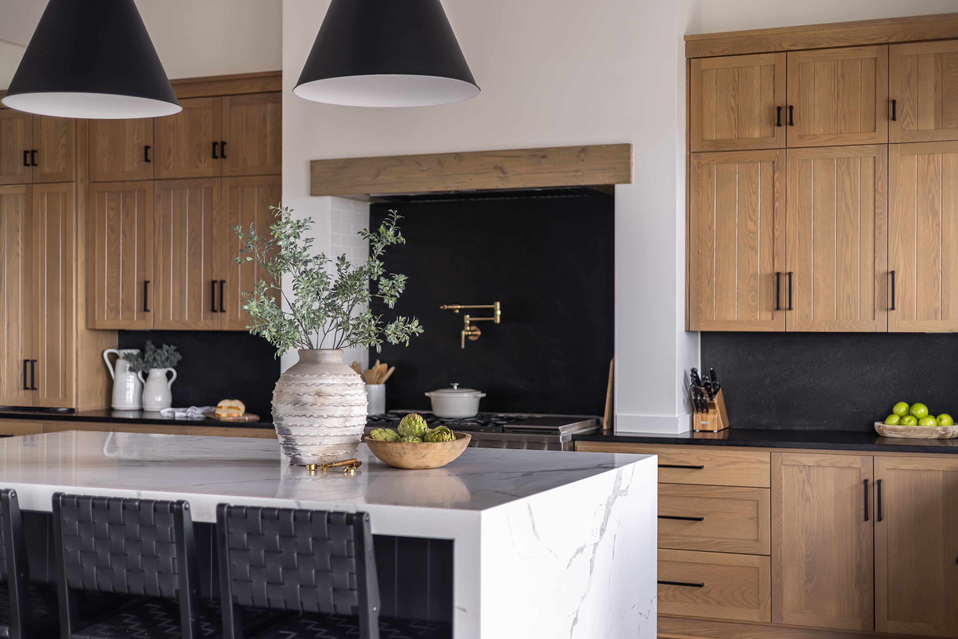 Kitchen detail with timber and marble finishes for property styling