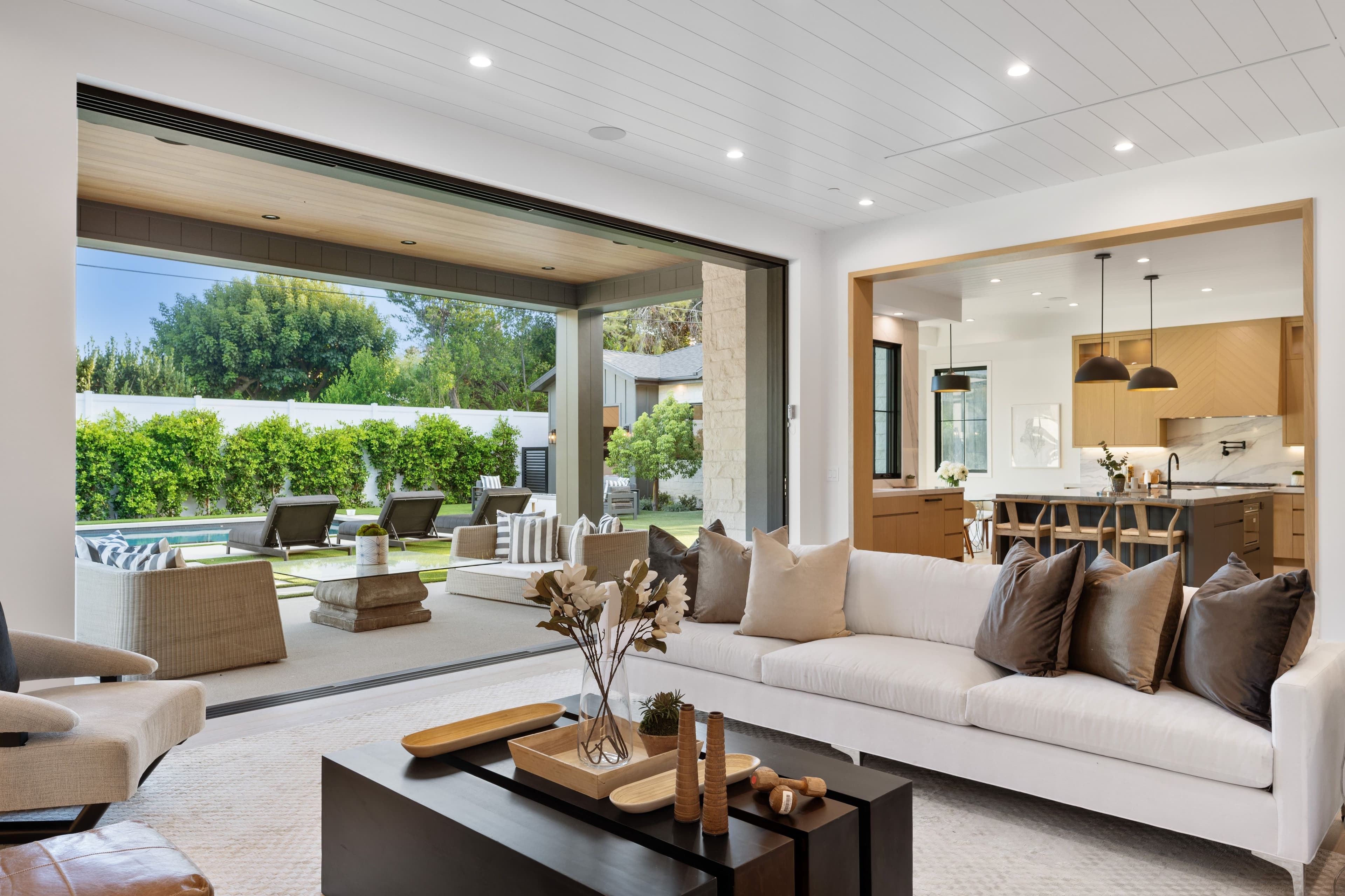 Styled indoor-outdoor living space with pool — Sydney property styling by Styling Lab